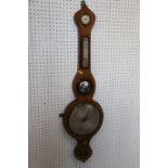 A 19th century walnut cased barometer, thermometer and hygrometer with silvered dials, 37"