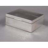 A silver cigarette box with cedar wood lining and oak base, 4 1/4" wide