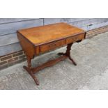 A burr walnut and banded sofa table, fitted two drawers, on panel end supports, united by flat