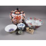 A Chinese bowl with floral decoration, 4" high x 9" dia, a blue and white jar and cover with four-