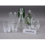 A 19th century cut glass decanter and a stopper, two cut glass vases and other glass vases, table