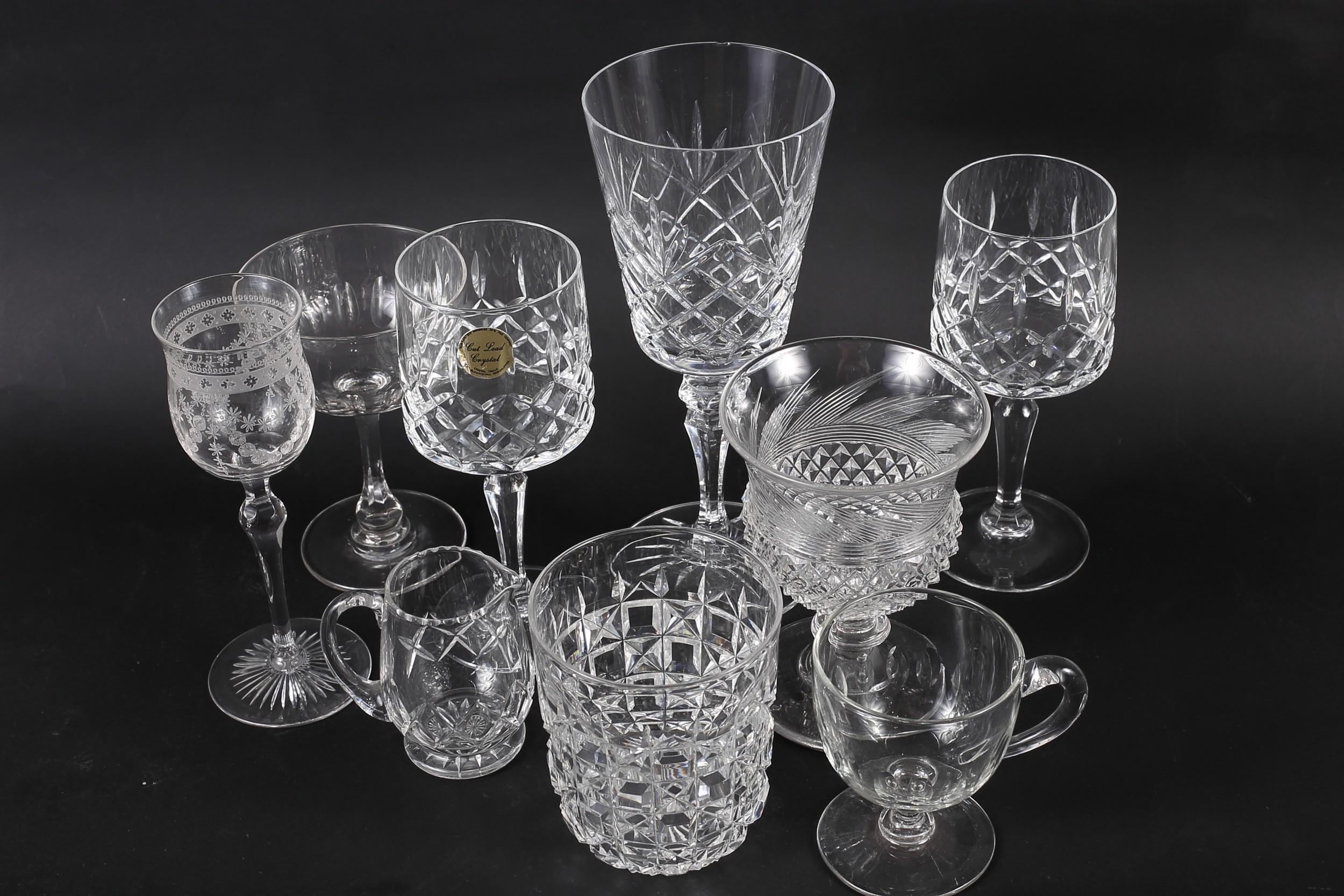 Six custard glasses, cut ovals, a set of six similar champagne glasses and other drinking glasses