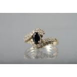 A 14ct gold, diamond and sapphire dress ring, size K, 2.5g