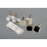 A silver scaled pocket knife with textured decoration, a pair of 9ct gold and onyx cufflinks and