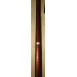 A 19th century turned mahogany curtain pole, a number of rings and brass mounts, pole 98" long