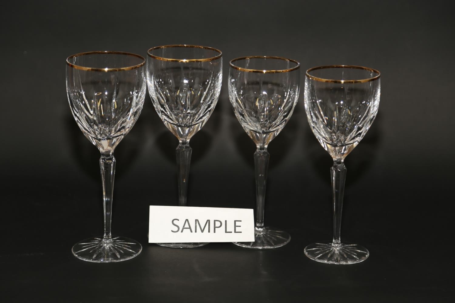 A Gorham cut and gilt glass part table service of twenty-three white and sixteen red wine glasses,