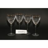 A Gorham cut and gilt glass part table service of twenty-three white and sixteen red wine glasses,