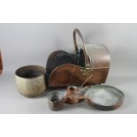A 19th century copper coal shute, a copper frying pan, two measures, a warming pan and an Indian