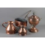 A copper and brass mounted tea urn, two copper jugs and a copper pan