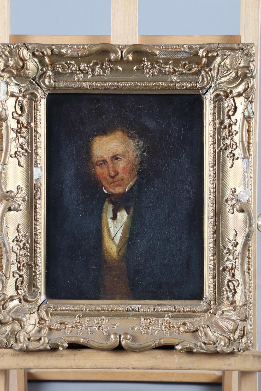 A mid 19th century oil on board of an unknown gentleman with yellow waistcoat, 8 1/2" x 6 1/2", in
