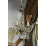 A glass and crystal drop five-light chandelier, 20" dia approx