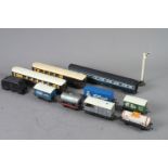 A Hornby Dublo carriage, another similar carriage, four Tri-ang waggons and other items