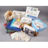 A quantity of world stamps, some loose, stock books and albums, and approximately fifty photographic