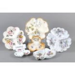 Twelve assorted trefoil-shaped luncheon dishes and assorted decorative china