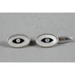 A pair of yellow and white metal, mother-of-pearl, onyx and diamond cufflinks, 6.5g