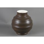 A Keith Murray brown glazed bulbous ribbed vase, 9 1/2" high