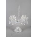 A Waterford cut crystal two-branch table lustre, 19" high (one drop deficient)