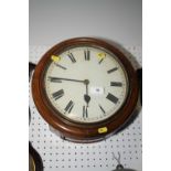 A circular dial wall clock