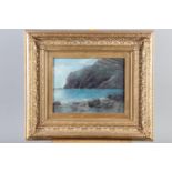Early 20th century oil on board, coastal landscape with cliffs, 8 1/2" x 11", in deep gilt frame