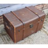 A late 19th century canvas and maple bound travel trunk with fitted interior and lift-out tray