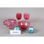 Eight wine glasses with ruby bowls, two similar bowls, a pair of paperweights, a Doulton Lambeth