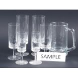 A 1960s engraved glass part table service and four tankards