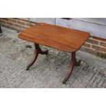 A mahogany coffee table, on splay supports, 28" wide x 18" deep x 18" high