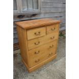 A waxed pine chest of two short and three long drawers, on a block base, 37" wide x 19 1/2" deep x