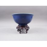 A Chinese blue monochrome bowl with double ring and six-character mark to base, 6" dia x 3" high, on