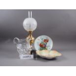A brass oil lamp with frosted glass shade, 18" overall, a Carlton Ware shaped dish, a clear glass