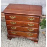 A Brights of Nettlebed mahogany chest of four drawers, on bracket feet, 17" wide x 13" deep x 23"