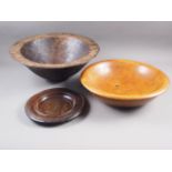 A maple bowl, 15" dia, a birch bowl, 14" dia, a carved bowl, 17" dia, and a collection dish