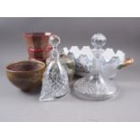 A French red glazed sectioned faceted vase, 9 1/4" high, two clear cut glass decanters and stoppers,