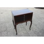 A Community silver plate part table canteen, in mahogany three drawer, on cabriole supports