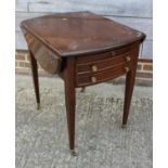 A mahogany oval drop leaf table, fitted one deep drawer, on tapering supports, 36" wide x 27" long x