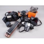 A Pentax K-X digital SLR camera and accessories, in carry case, a Pentax ME Super SLR camera and