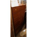 A Morris Villency teak chest of eight drawers, on block base, 22" wide x 15 1/2" deep x 49" high