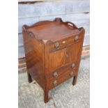 A mahogany tray top bedside cupboard/commode over pull-out slide, 20" wide x 17" deep x 32" high