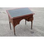An architect's 19th century mahogany table with adjustable tooled leather lined top, fitted two