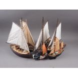 Seven wooden models of naval and sailing boats, various