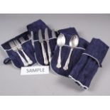 An extensive canteen of silver plated shell-back flatware