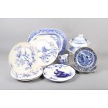 A 19th century blue and white sauce tureen and cover, a ladle and stand, two Davenport "Willow"