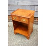 A burr walnut bedside table, fitted two drawers over a shelf, on bracket feet, 17 1/2" wide x 13