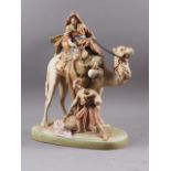 A Royal Crown Dux model of a camel and rider, 17 1/2" high