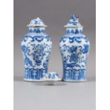 A pair of Chinese blue and white baluster vases with precious object, koi carp and flower