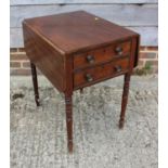 A mahogany drop leaf table, fitted two drawers, on turned  supports, 20" wide x 13" deep x 28" high