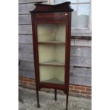 A mahogany inlaid corner cabinet with three shelves enclosed single glazed door, 15" wide x 6 1/2"