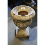 A marble urn with flared rim, 12" high