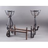 A pair of wrought iron cresset dogs, 19 1/2" high