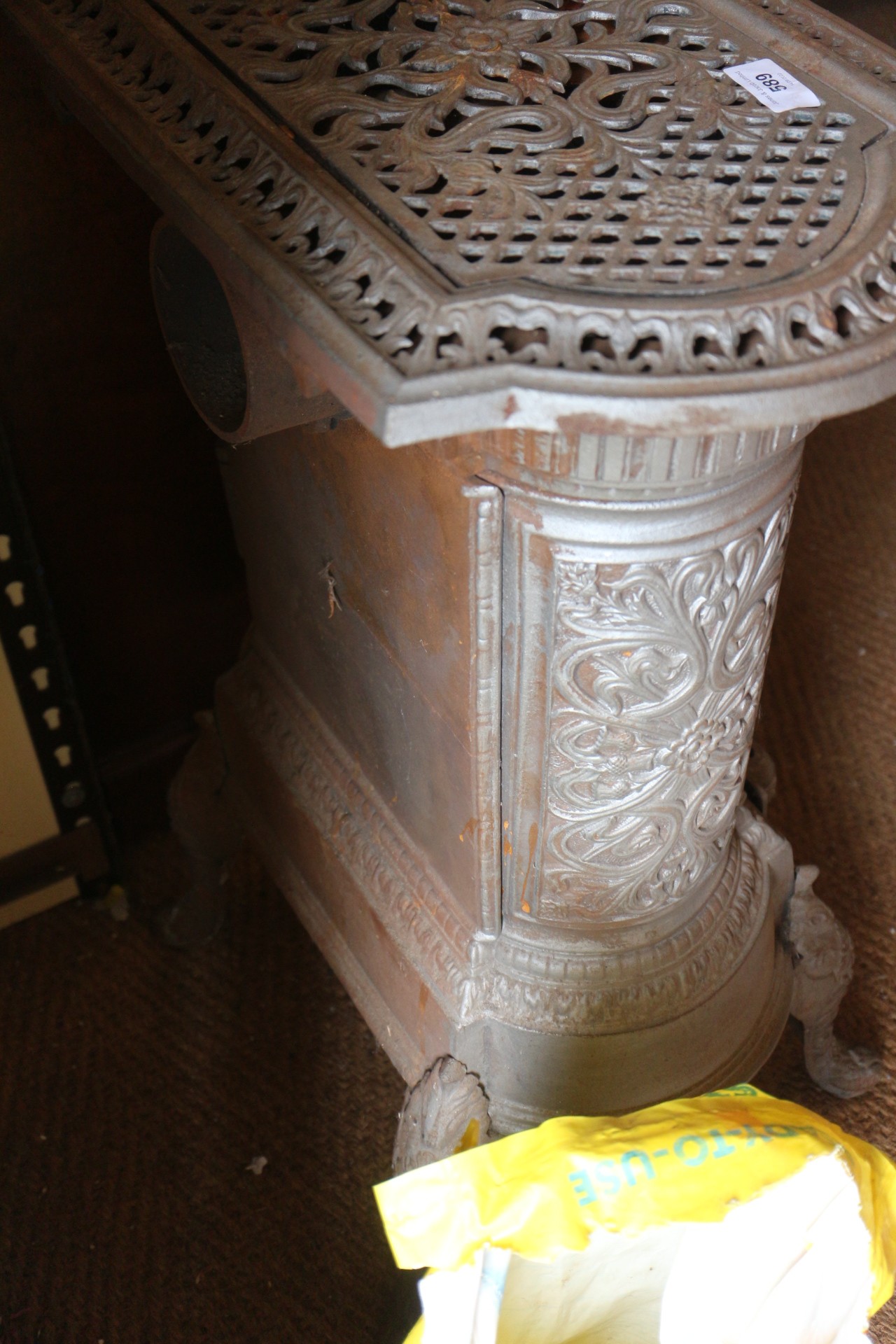 A grey painted cast iron stove with pierced decoration, on cabriole supports, 19" wide x 13" deep - Bild 9 aus 10